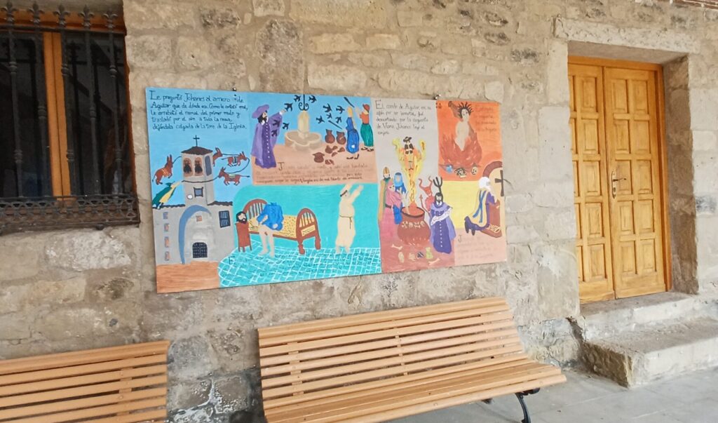 バルゴタの街中で見つけた、魔女や村の物語をカラフルに描いた壁画。